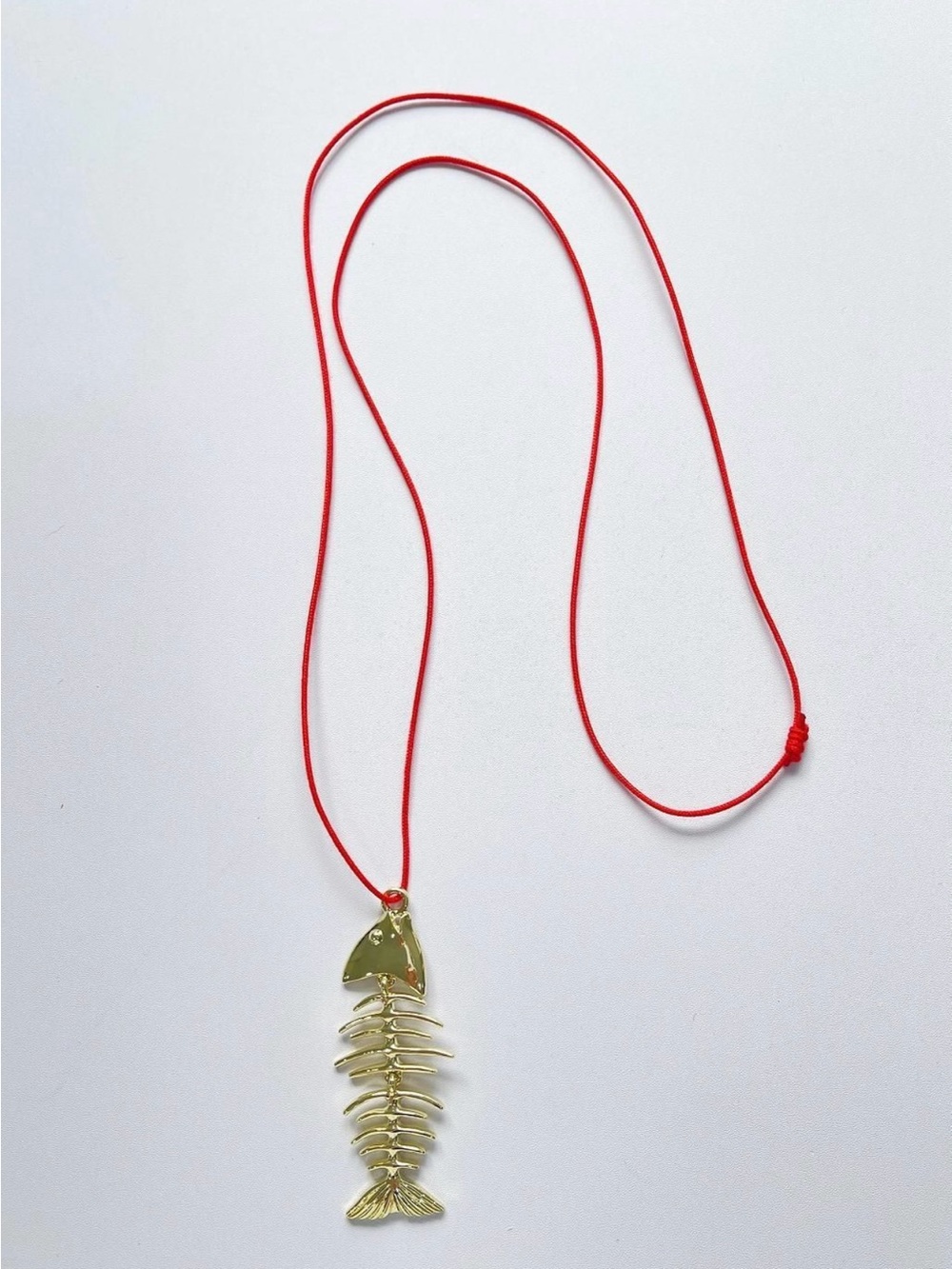 Gold Fishbone Pendant Necklace on Red Cord by Mayamar
